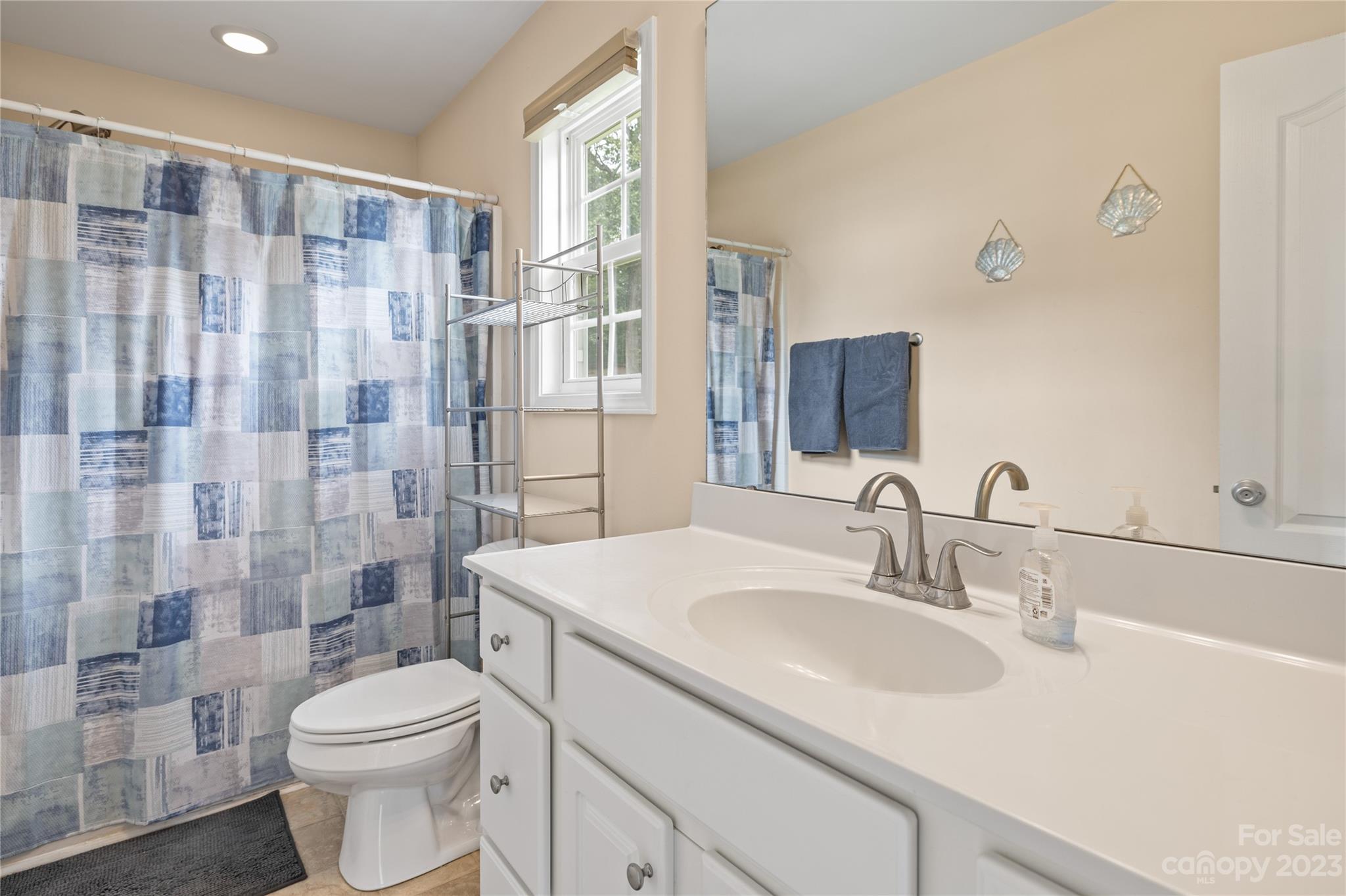 308 Fleetwood Road York, SC 29745 - Photo 17 of 25 a bathroom with a sink toilet and shower