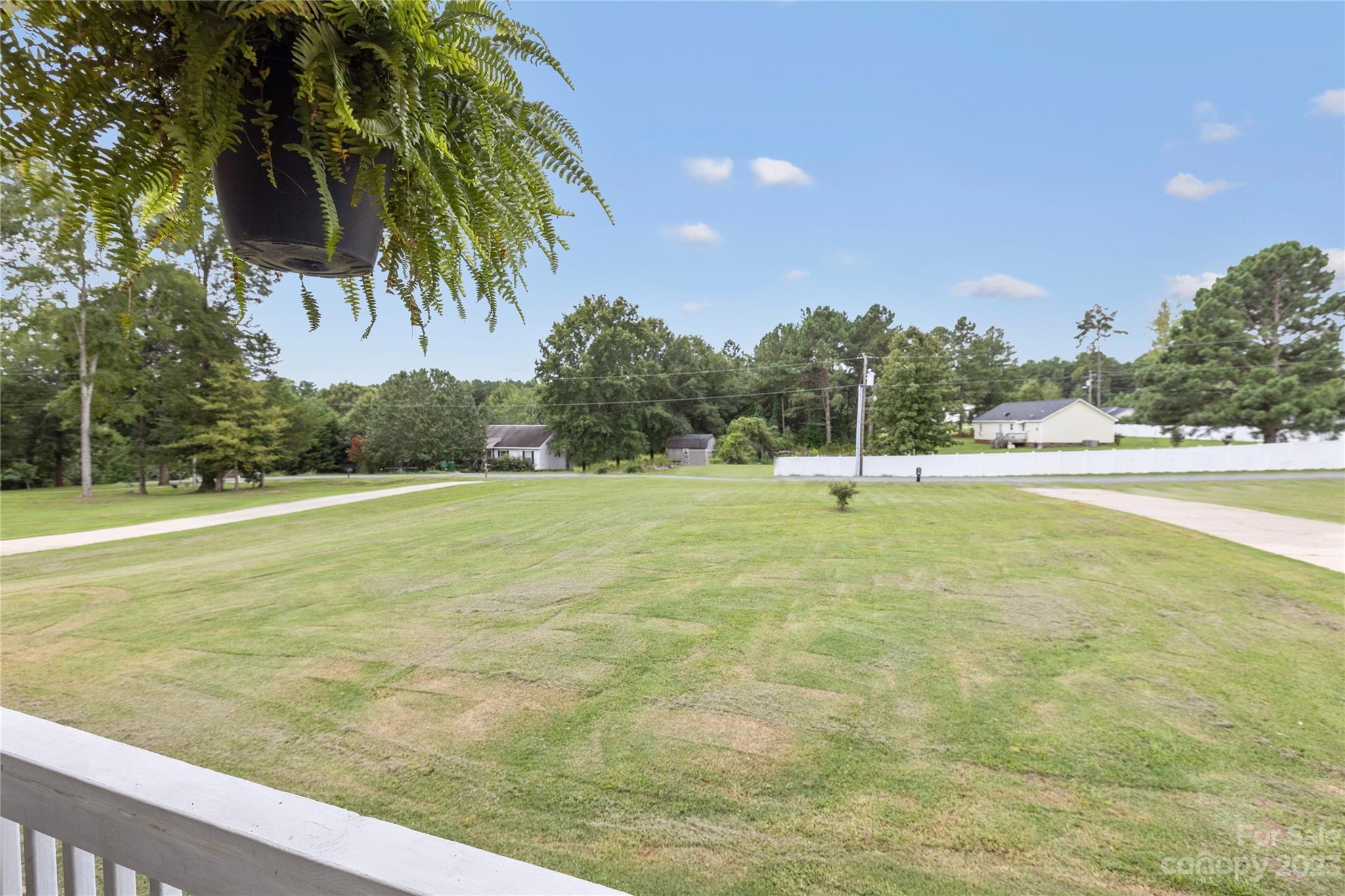 308 Fleetwood Road York, SC 29745 - Photo 3 of 25 a swimming pool with outdoor seating and yard