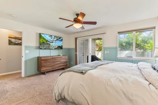 a bathroom with a sink double vanity granite and a mirror