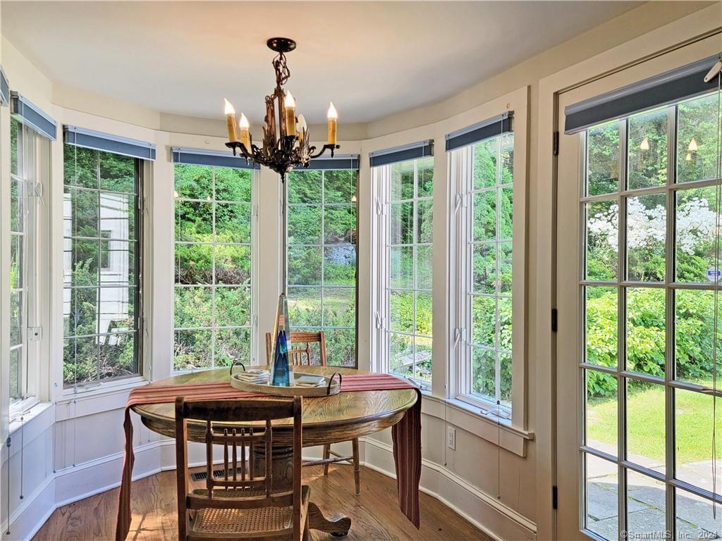 22 Ketcham Road Ridgefield, CT 06877 - Photo 37 of 40 a view of a dining room with furniture window and outside view