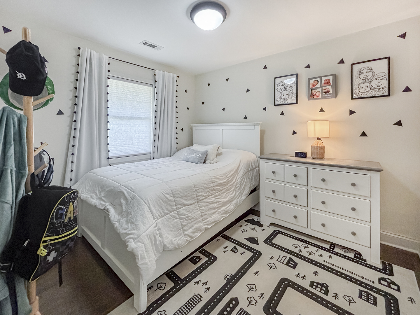 8538 45th Street Lyons, IL 60534 - Photo 9 of 29 a bedroom with a bed and a chandelier