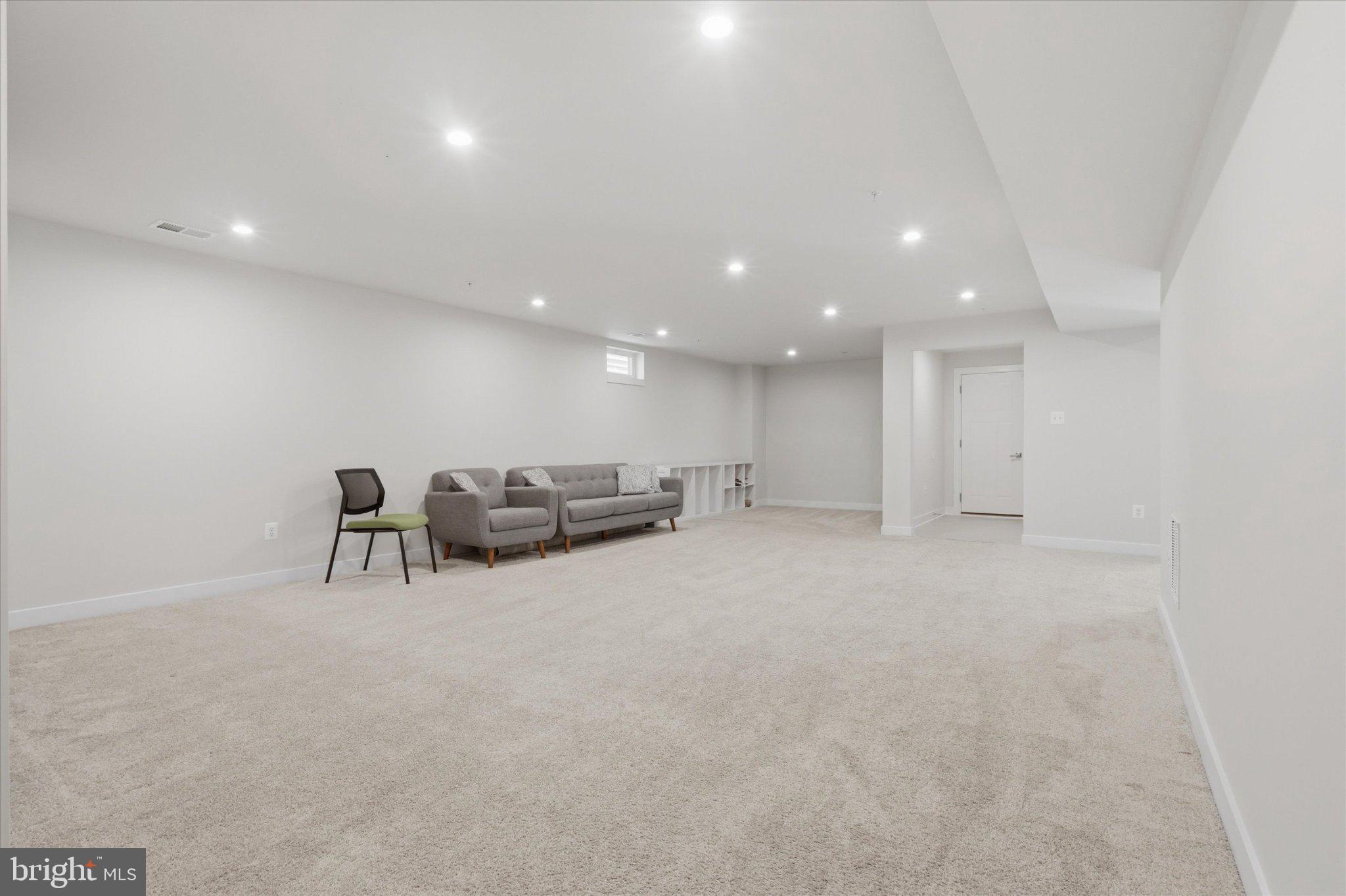 21839 Clarksburg Road Clarksburg, MD 20841 - Photo 25 of 39 Spacious, versatile living area in the Basement