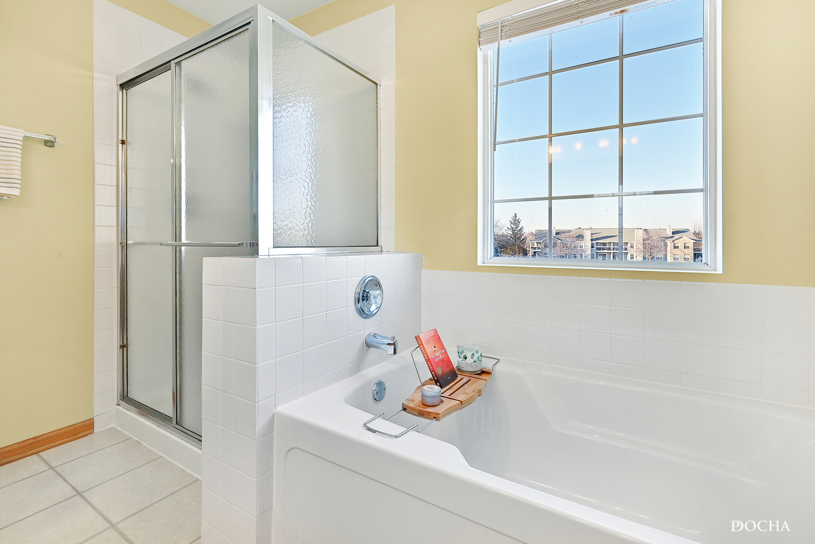 1809 Golden Gate Lane Naperville, IL 60563 - Photo 18 of 25 a bathroom with a bathtub and a sink