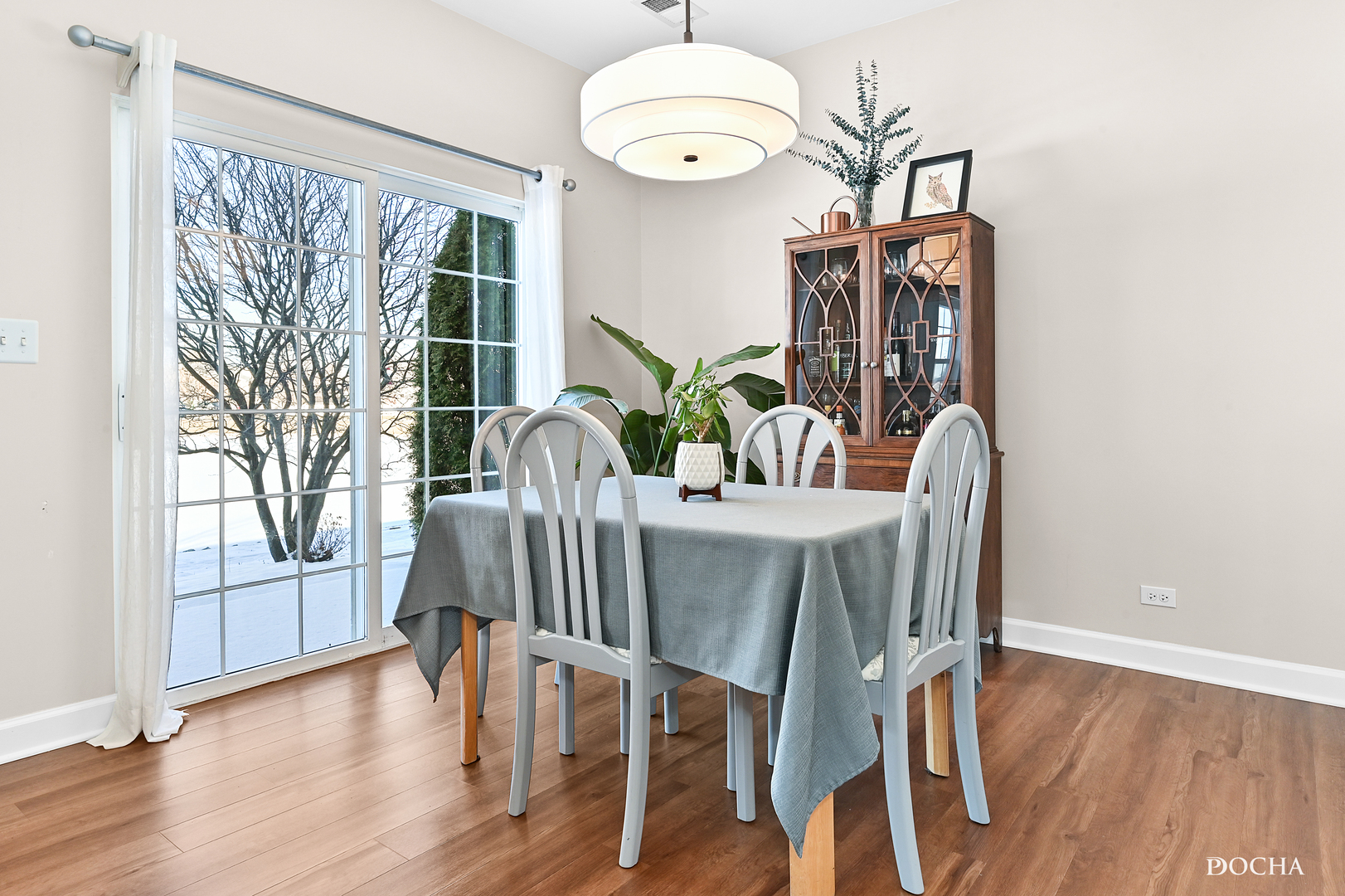 1809 Golden Gate Lane Naperville, IL 60563 - Photo 5 of 25 a view of a dining room with furniture window and wooden floor