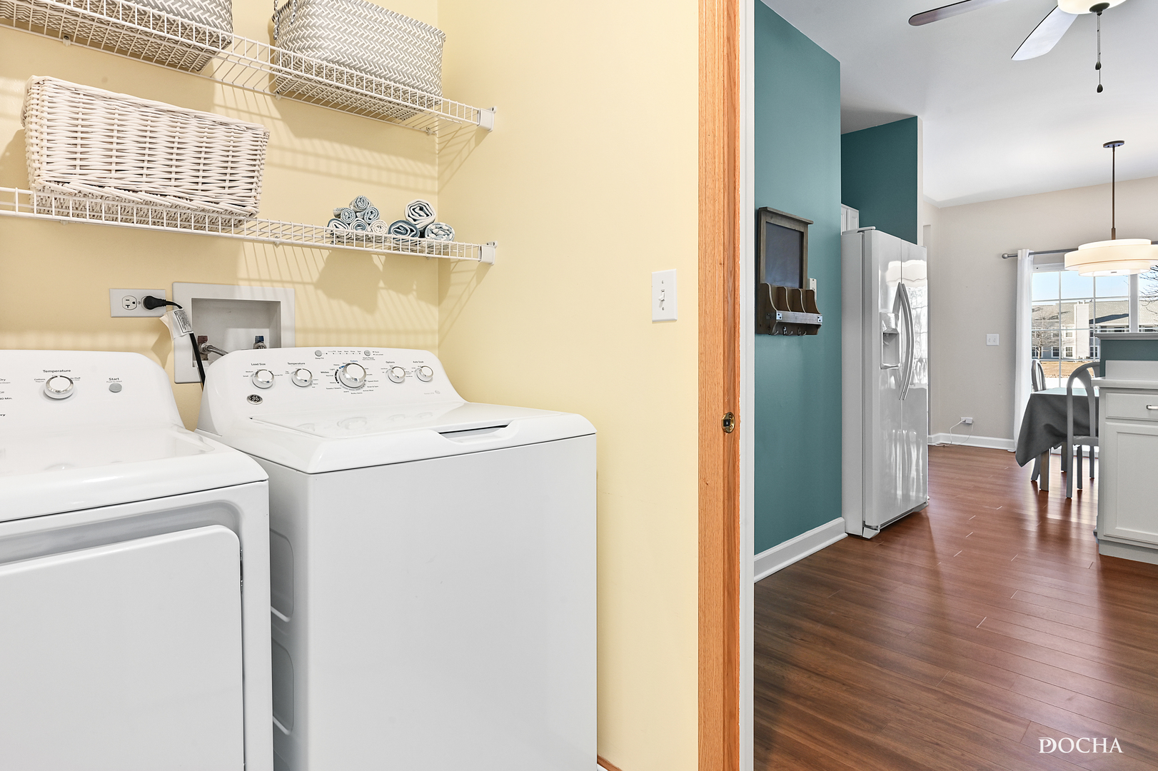 1809 Golden Gate Lane Naperville, IL 60563 - Photo 9 of 25 a view of washer and dryer with wooden floor