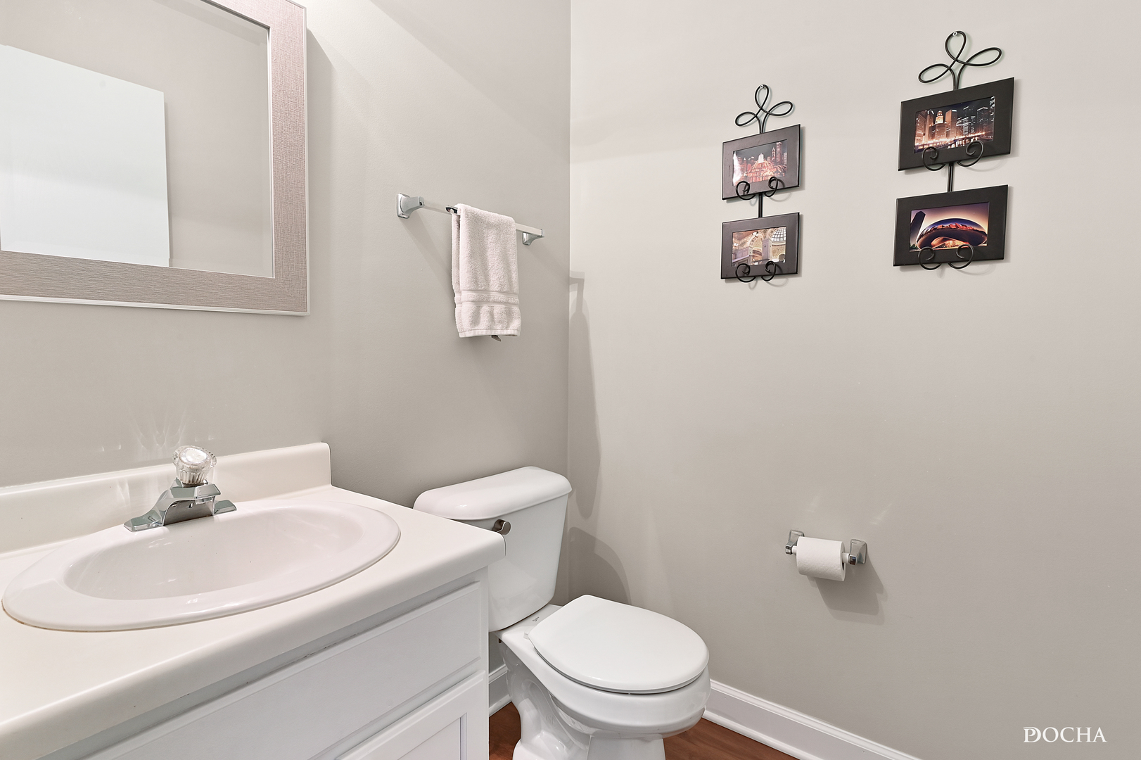 1809 Golden Gate Lane Naperville, IL 60563 - Photo 10 of 25 a white toilet sitting next to a bathroom sink