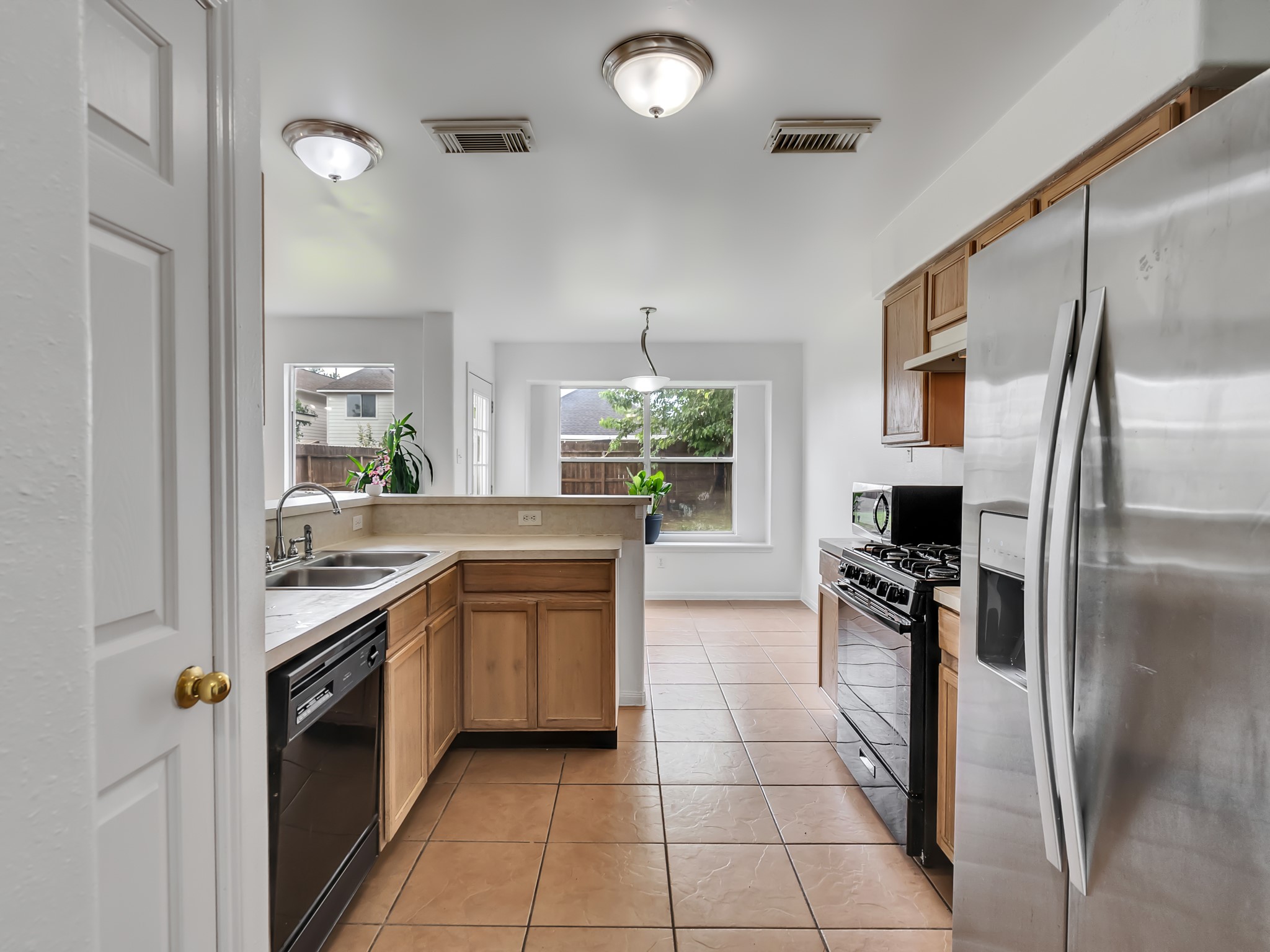 7211 Calcutta Spring Drive Houston, TX 77083 - Photo 3 of 17 Light wood kitchen