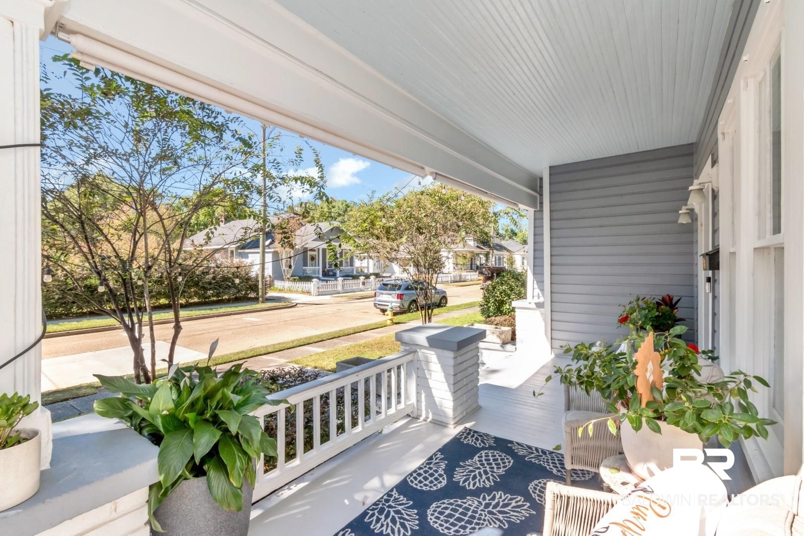 116 Item Avenue Mobile, AL 36607 - Photo 4 of 33 View of patio featuring a porch