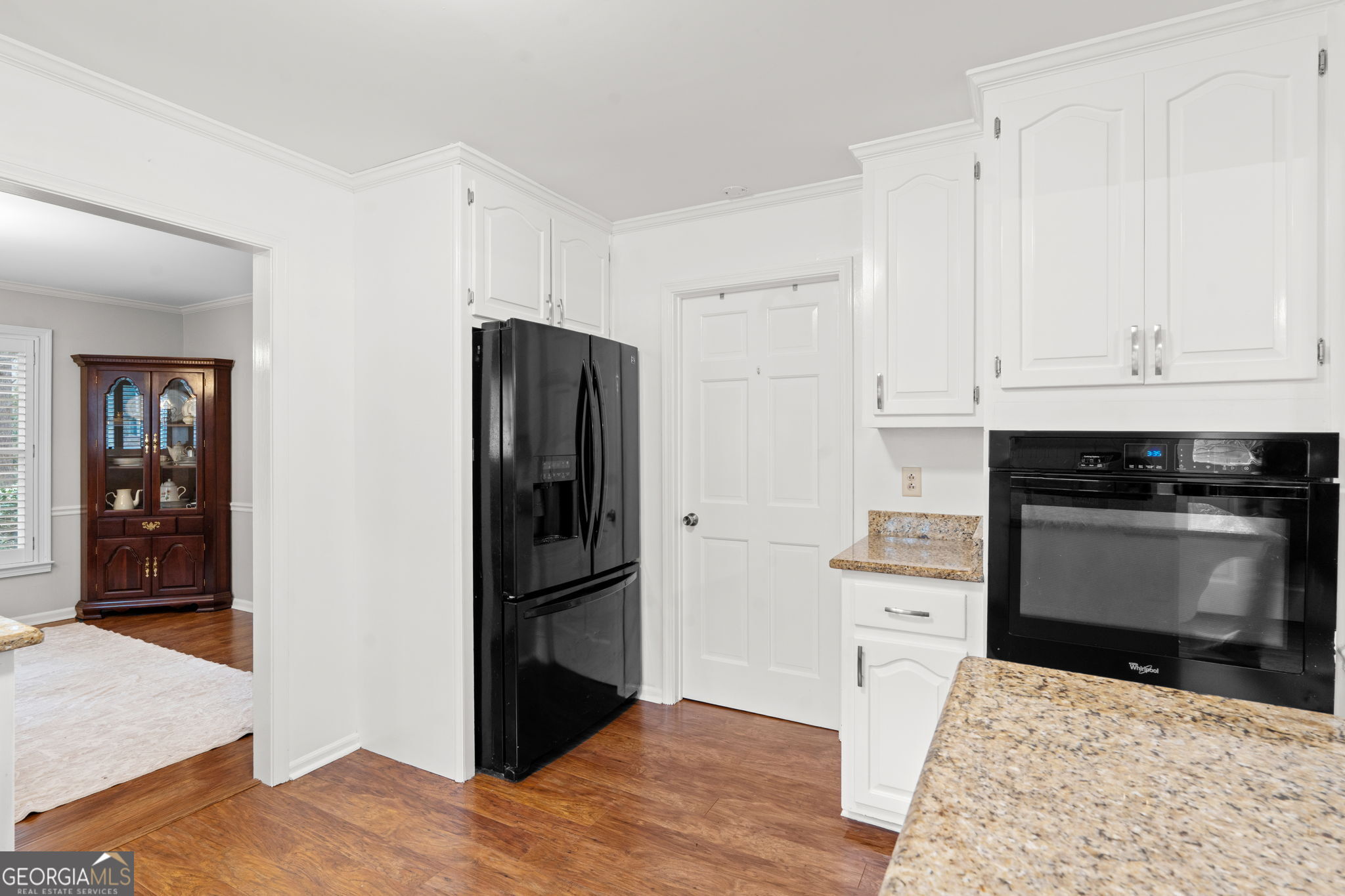 732 Bass Road Macon, GA 31210 - Photo 12 of 57 a kitchen with stainless steel appliances kitchen island granite countertop a refrigerator stove and sink
