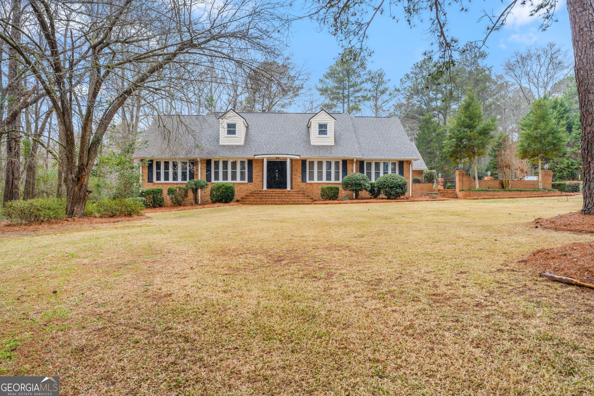 732 Bass Road Macon, GA 31210 - Photo 2 of 57 a view of a building with a yard
