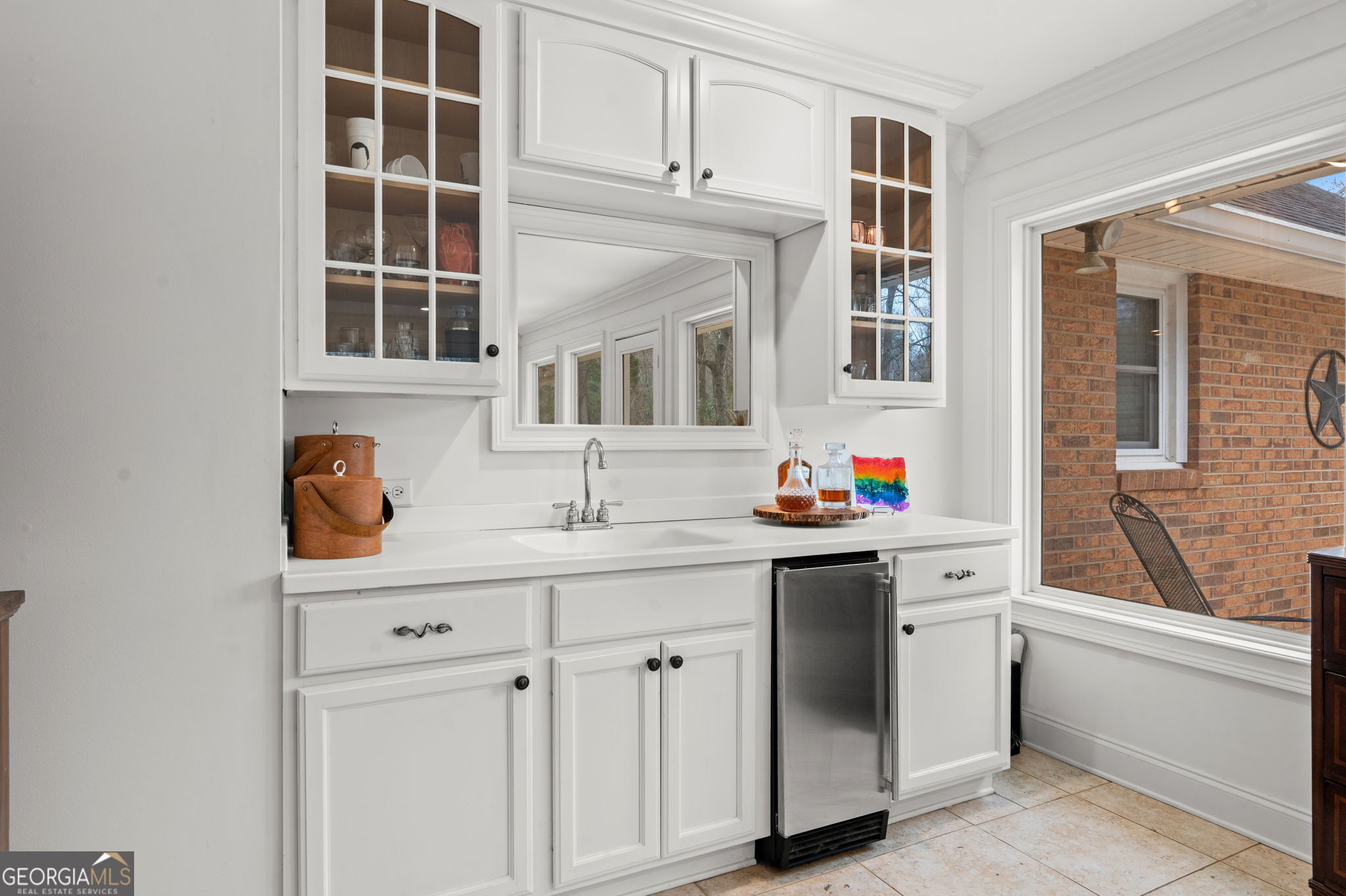 732 Bass Road Macon, GA 31210 - Photo 24 of 57 a bathroom with a sink and a mirror