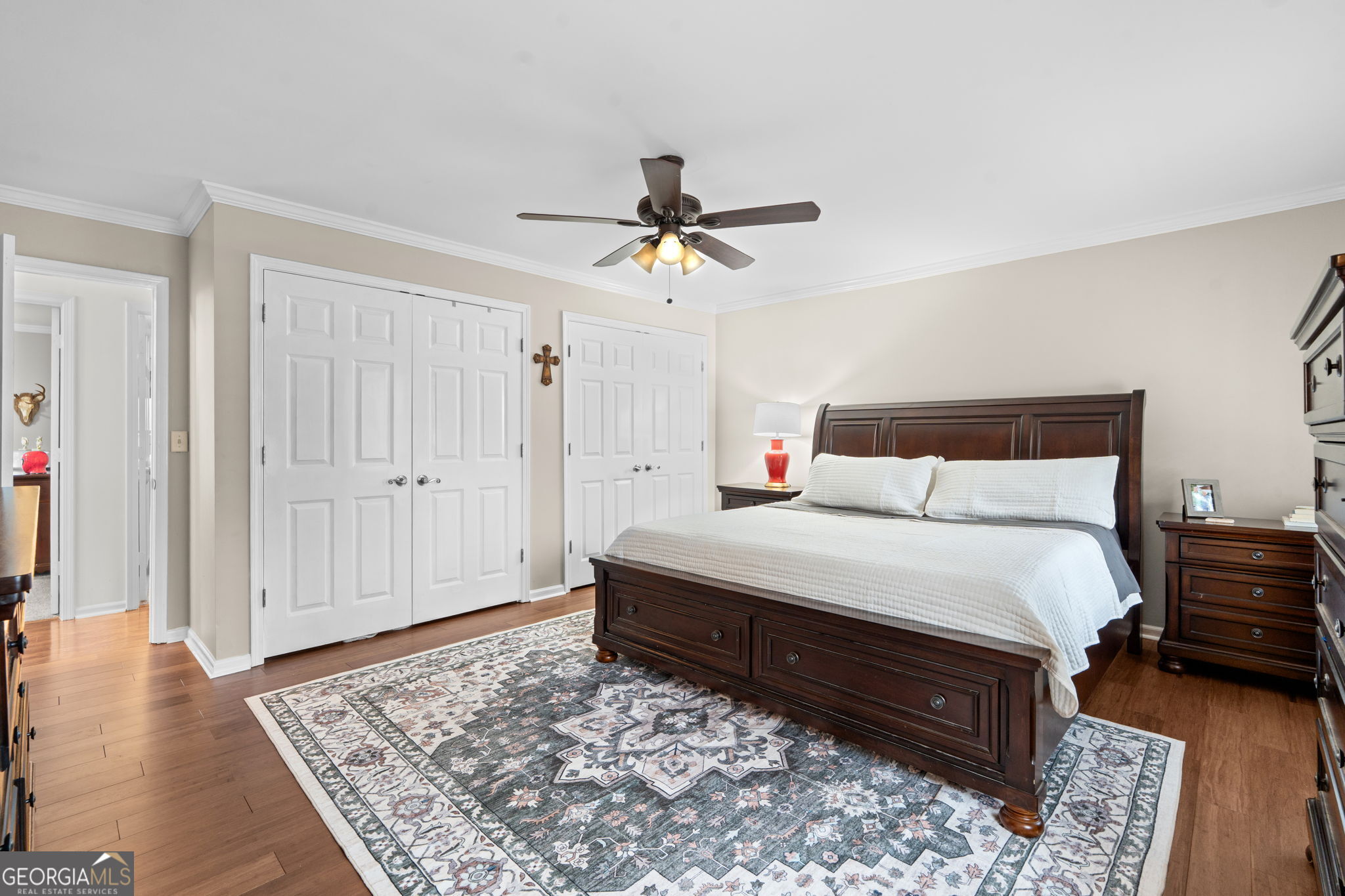 732 Bass Road Macon, GA 31210 - Photo 32 of 57 a bedroom with a bed and wooden floor