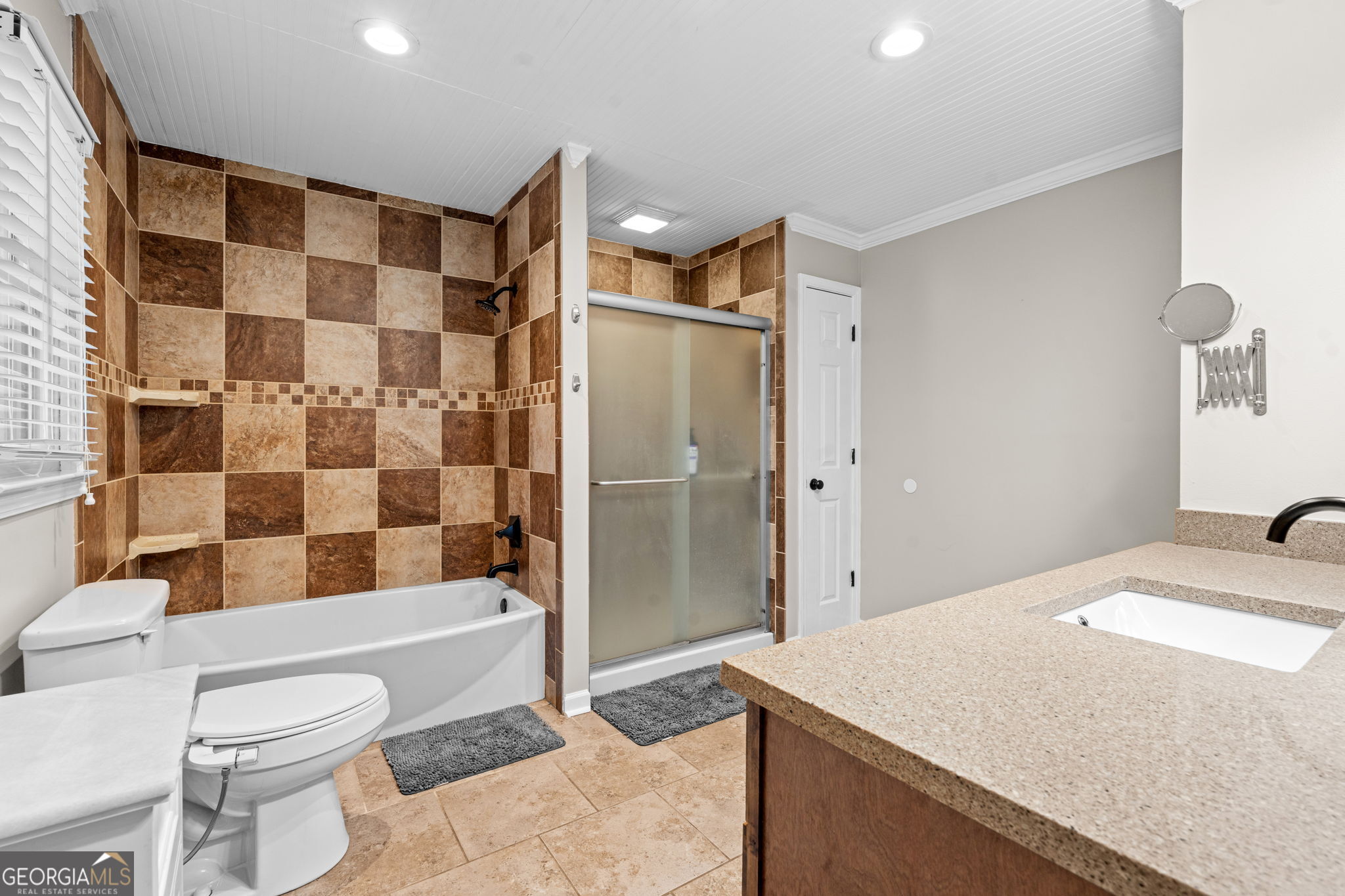 732 Bass Road Macon, GA 31210 - Photo 34 of 57 a bathroom with a sink toilet and shower