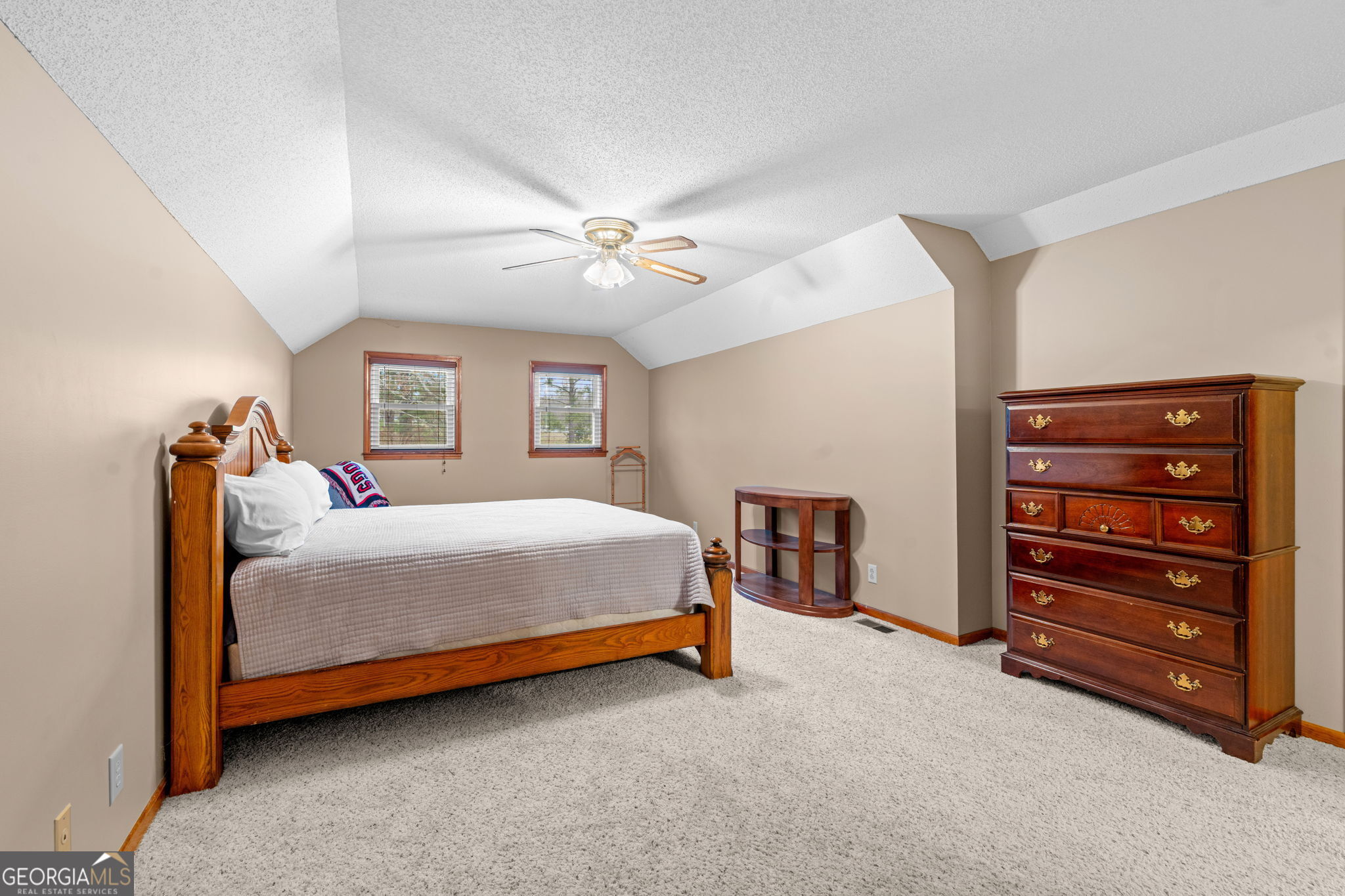 732 Bass Road Macon, GA 31210 - Photo 42 of 57 a bed room with a bed and a ceiling fan