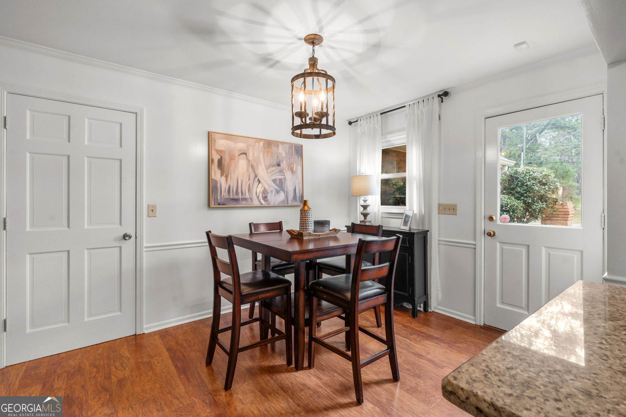 732 Bass Road Macon, GA 31210 - Photo 6 of 57 a view of a dining room with furniture window and wooden floor