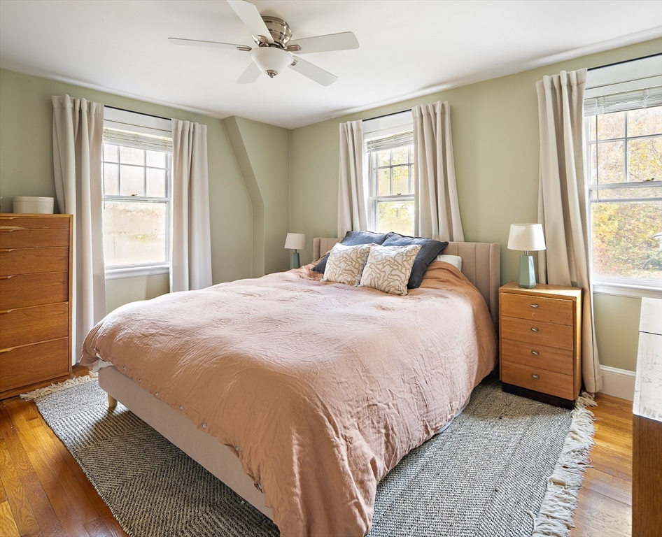 49 Cottage Street Sharon, MA 02067 - Photo 11 of 26 a bedroom with a large bed and a window