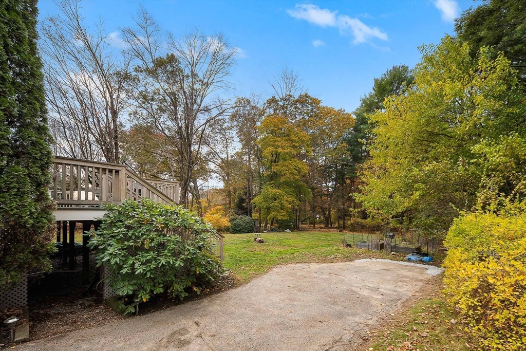 49 Cottage Street Sharon, MA 02067 - Photo 21 of 26 a view of a house with a yard