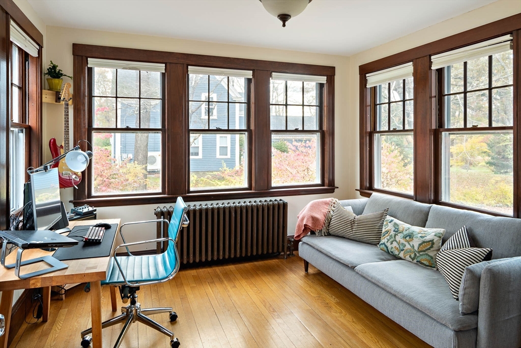 49 Cottage Street Sharon, MA 02067 - Photo 10 of 26 a living room with furniture and windows