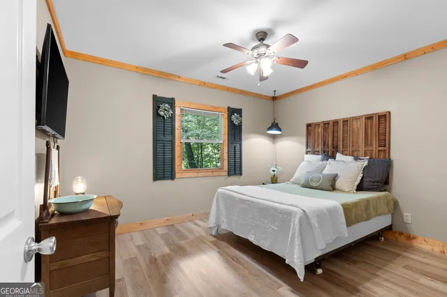 a view of a chairs in backyard of the house