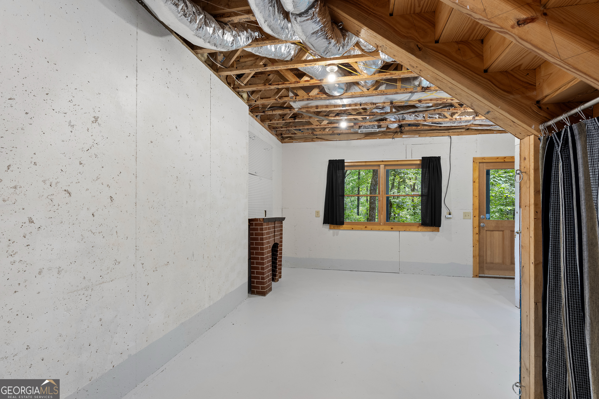 224 Dragon Tree Lane Lakemont, GA 30552 - Photo 24 of 38 a view of an empty room with a window
