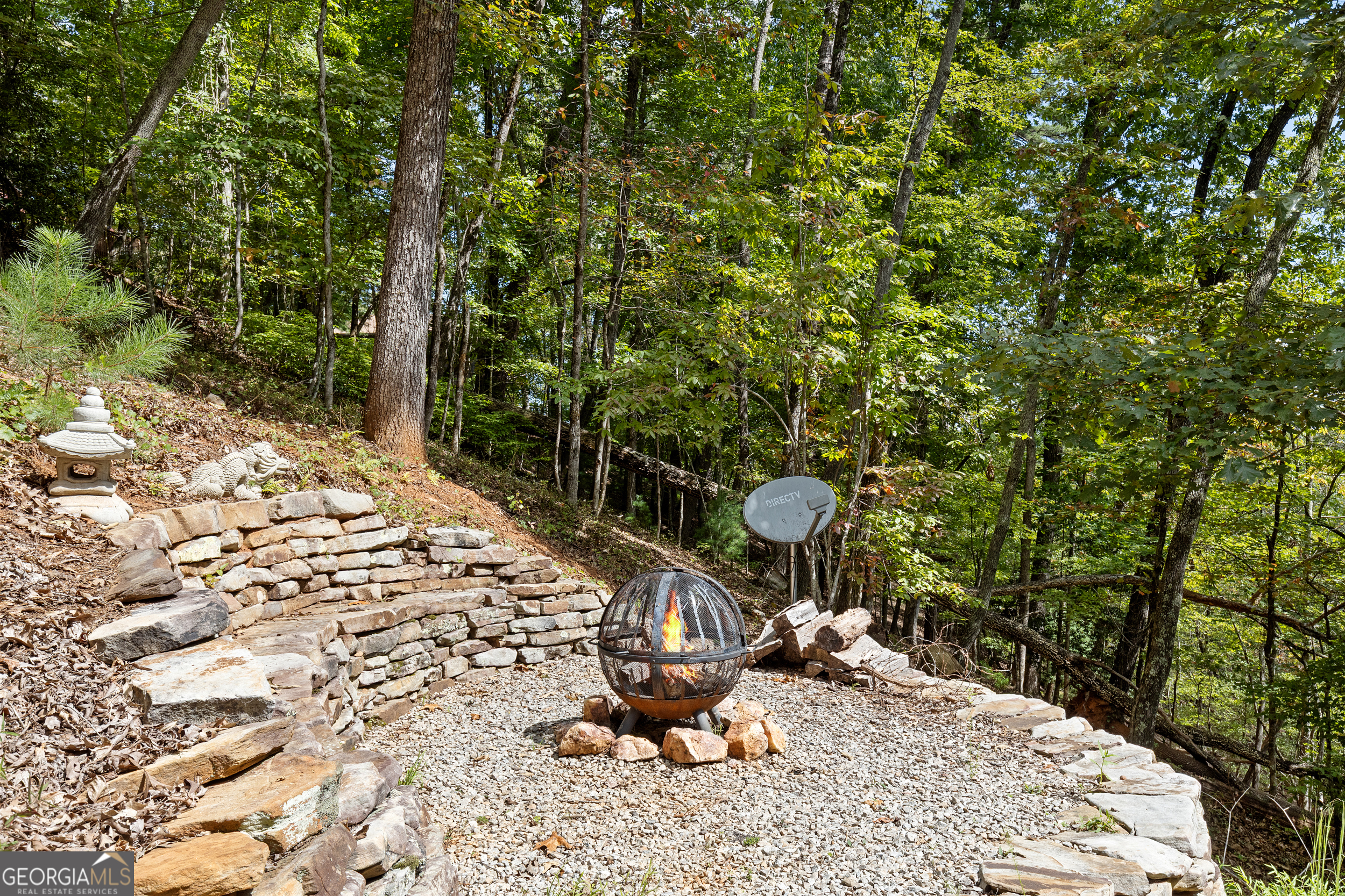 224 Dragon Tree Lane Lakemont, GA 30552 - Photo 27 of 38 a view of a chairs in backyard of the house