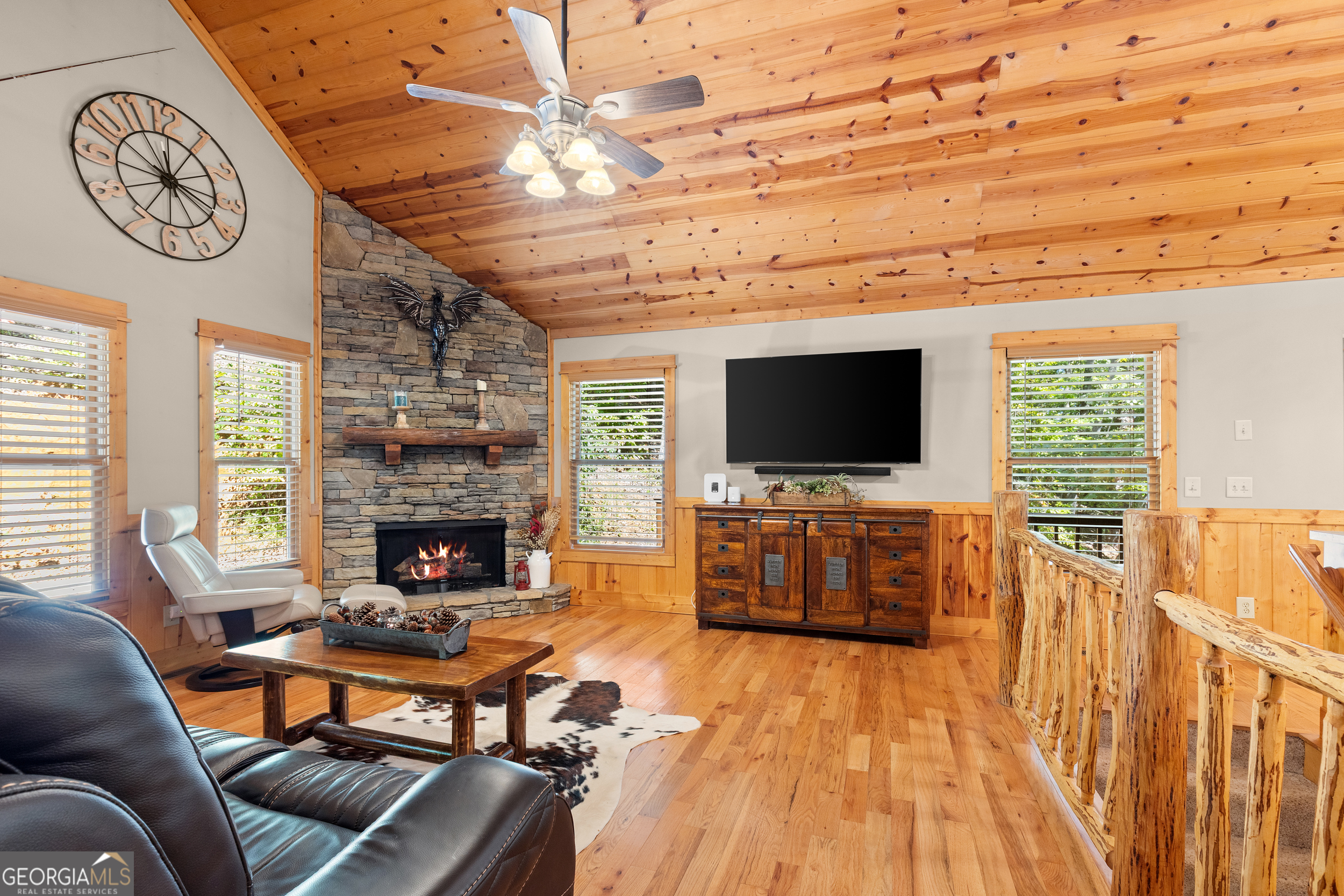 224 Dragon Tree Lane Lakemont, GA 30552 - Photo 4 of 38 a living room with furniture and a flat screen tv