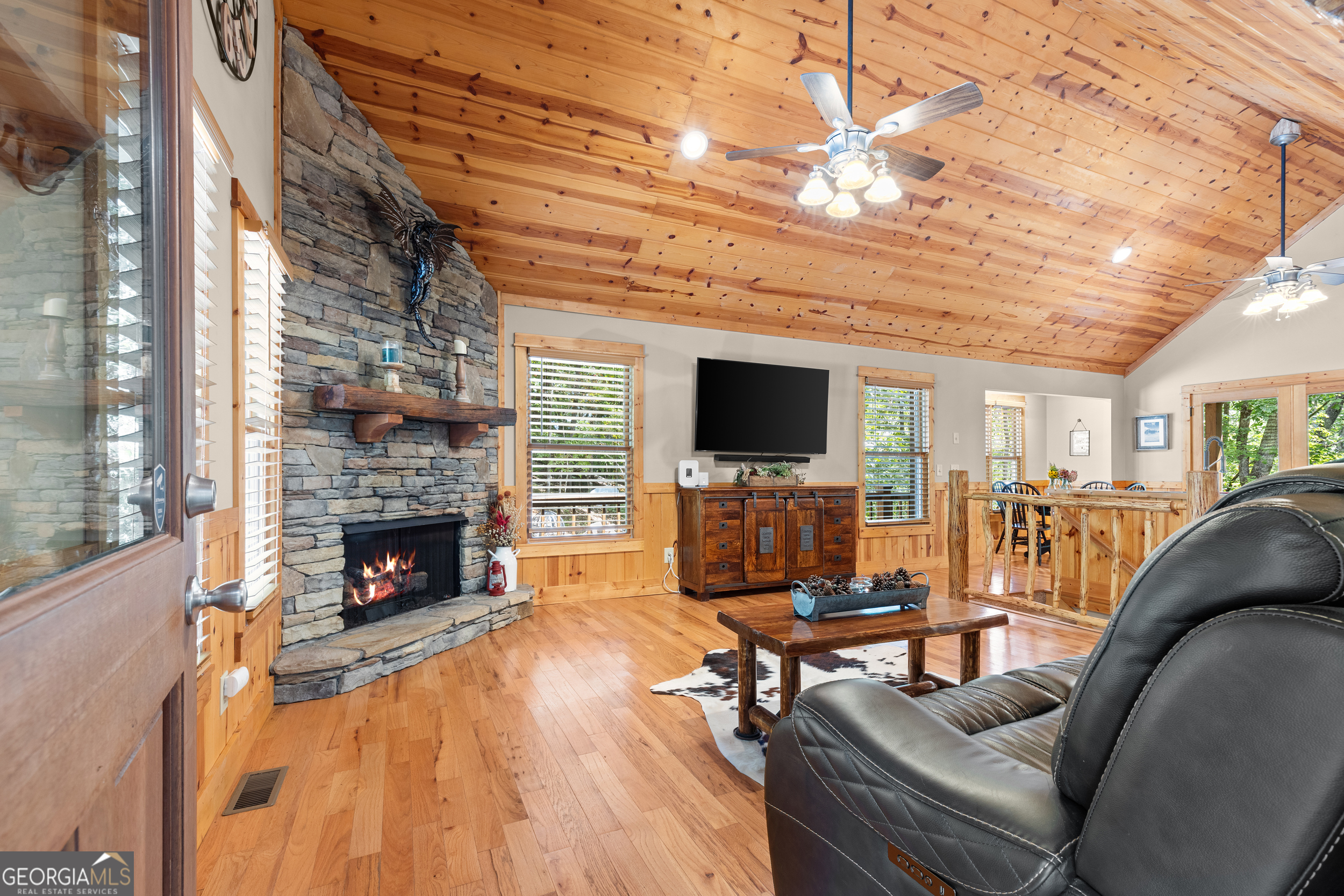 224 Dragon Tree Lane Lakemont, GA 30552 - Photo 5 of 38 a living room with furniture and a fireplace