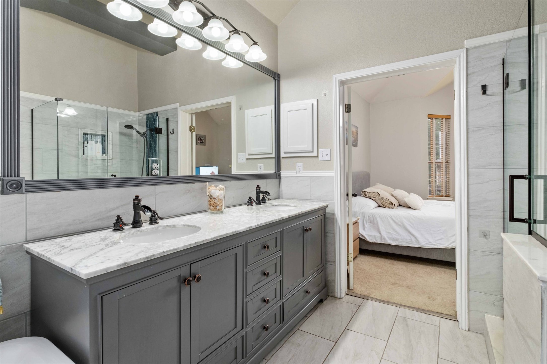 3704 Runnels Court Austin, TX 78732 - Photo 16 of 30 Bathroom featuring a shower stall, ensuite bath