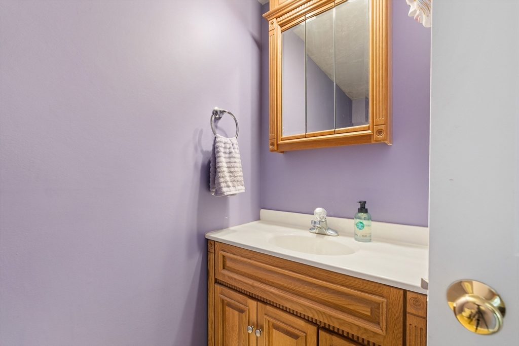 72 Sophia Drive Worcester, MA 01607 - Photo 14 of 25 a bathroom with a sink and a mirror