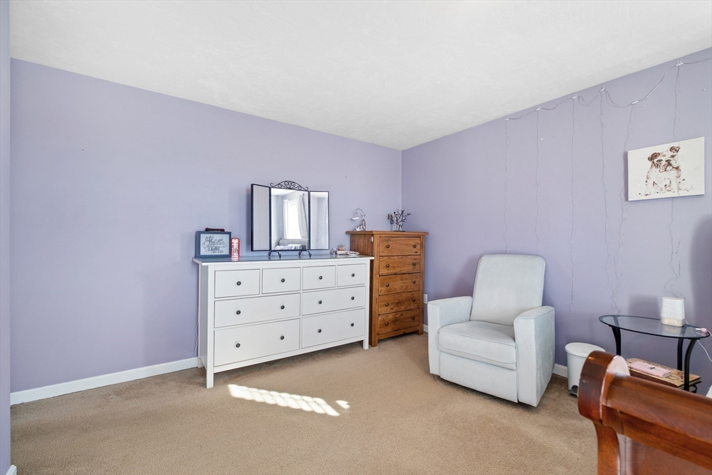 72 Sophia Drive Worcester, MA 01607 - Photo 16 of 25 a bedroom with furniture and a dresser