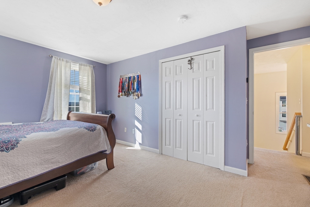 72 Sophia Drive Worcester, MA 01607 - Photo 17 of 25 a bedroom with a bed and a window