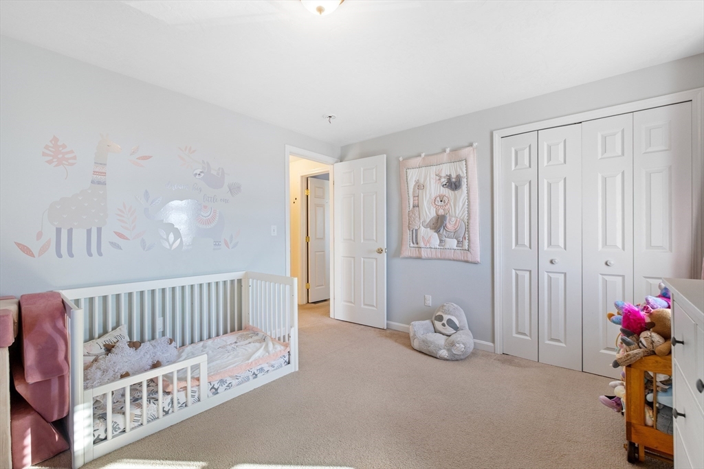 72 Sophia Drive Worcester, MA 01607 - Photo 21 of 25 a bedroom with furniture and a window