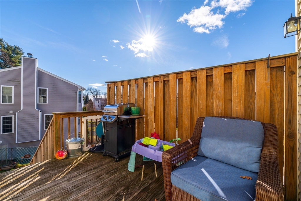 72 Sophia Drive Worcester, MA 01607 - Photo 22 of 25 a balcony with furniture and wooden floor