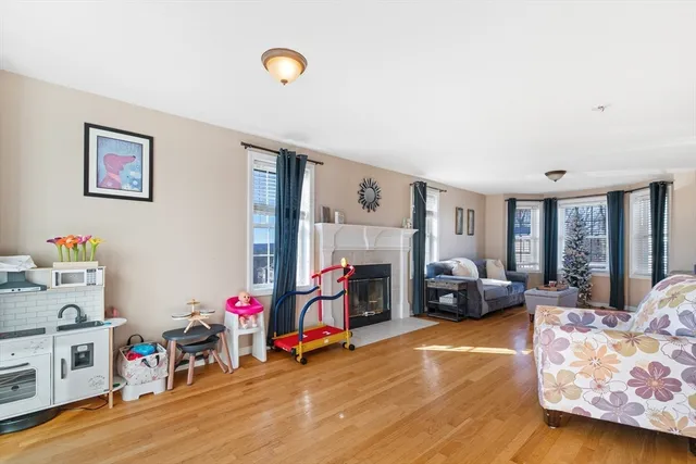 a view of a living room and dining room