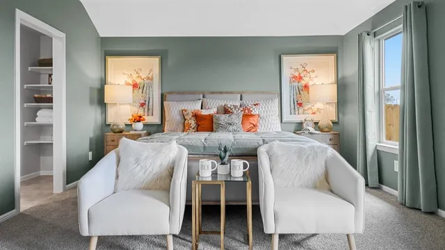 a bedroom with a bed and a cabinets