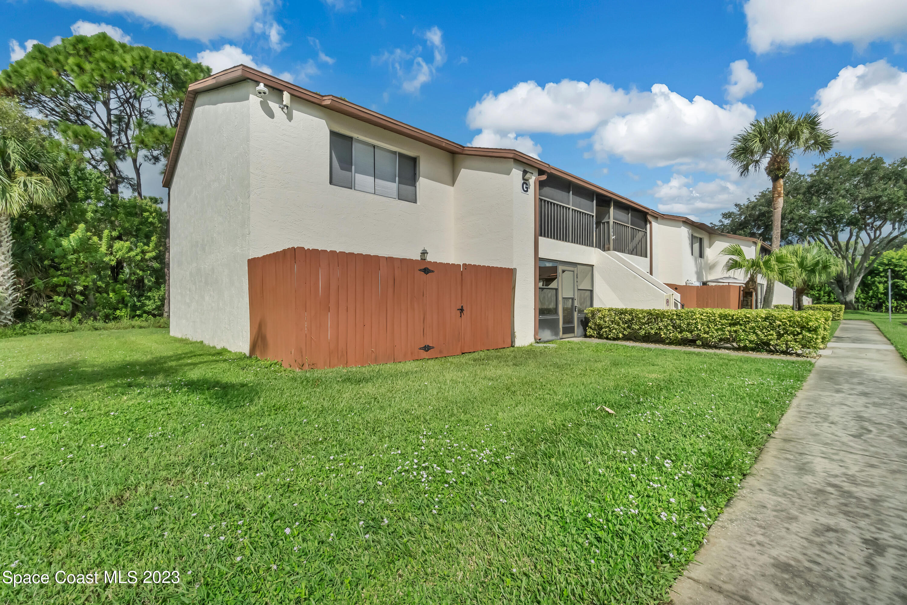 700 Ridge Club Drive, Unit 33 Melbourne, FL 32934 - Photo 25 of 32 a view of backyard with garden