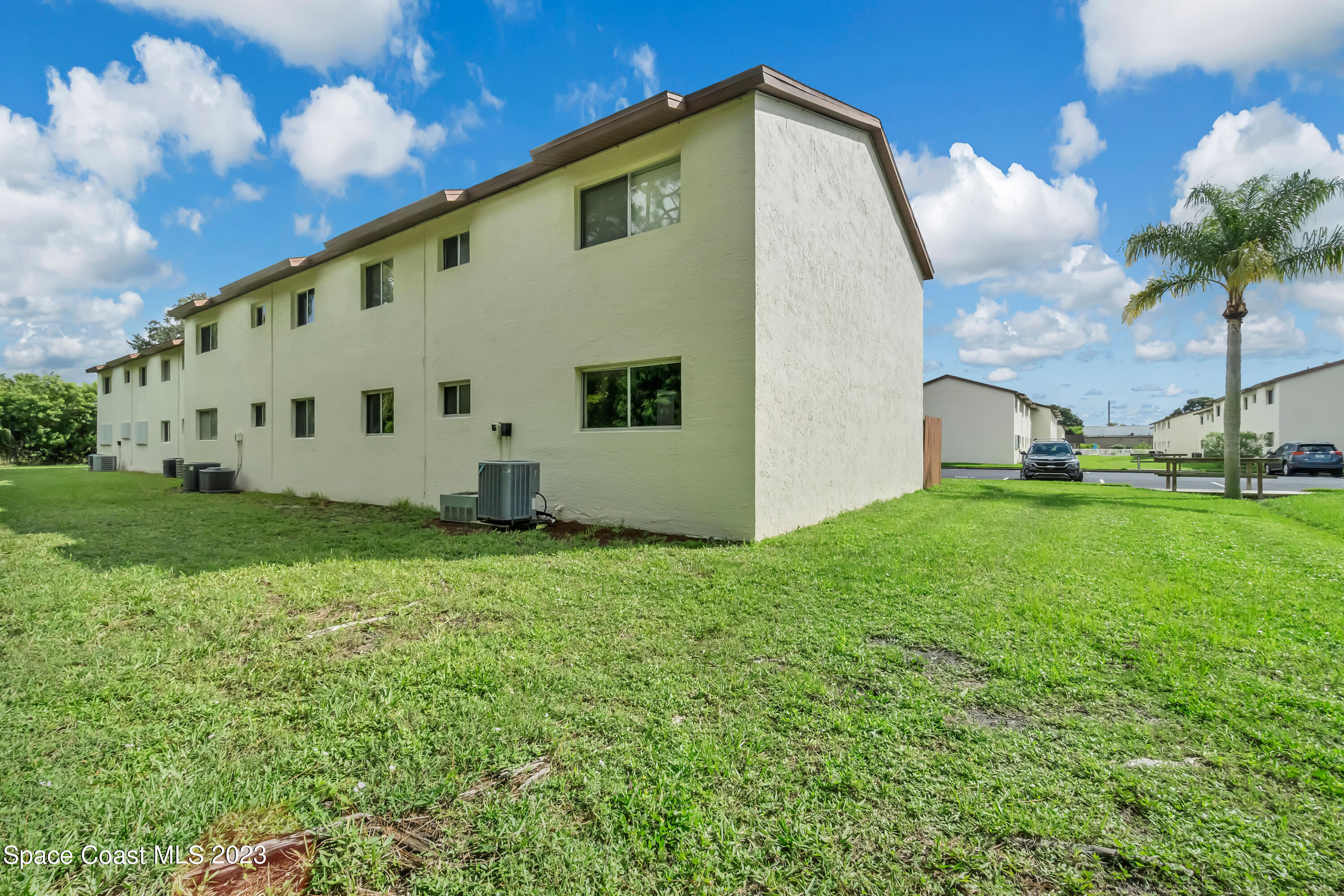 700 Ridge Club Drive, Unit 33 Melbourne, FL 32934 - Photo 26 of 32 a view of backyard with garden