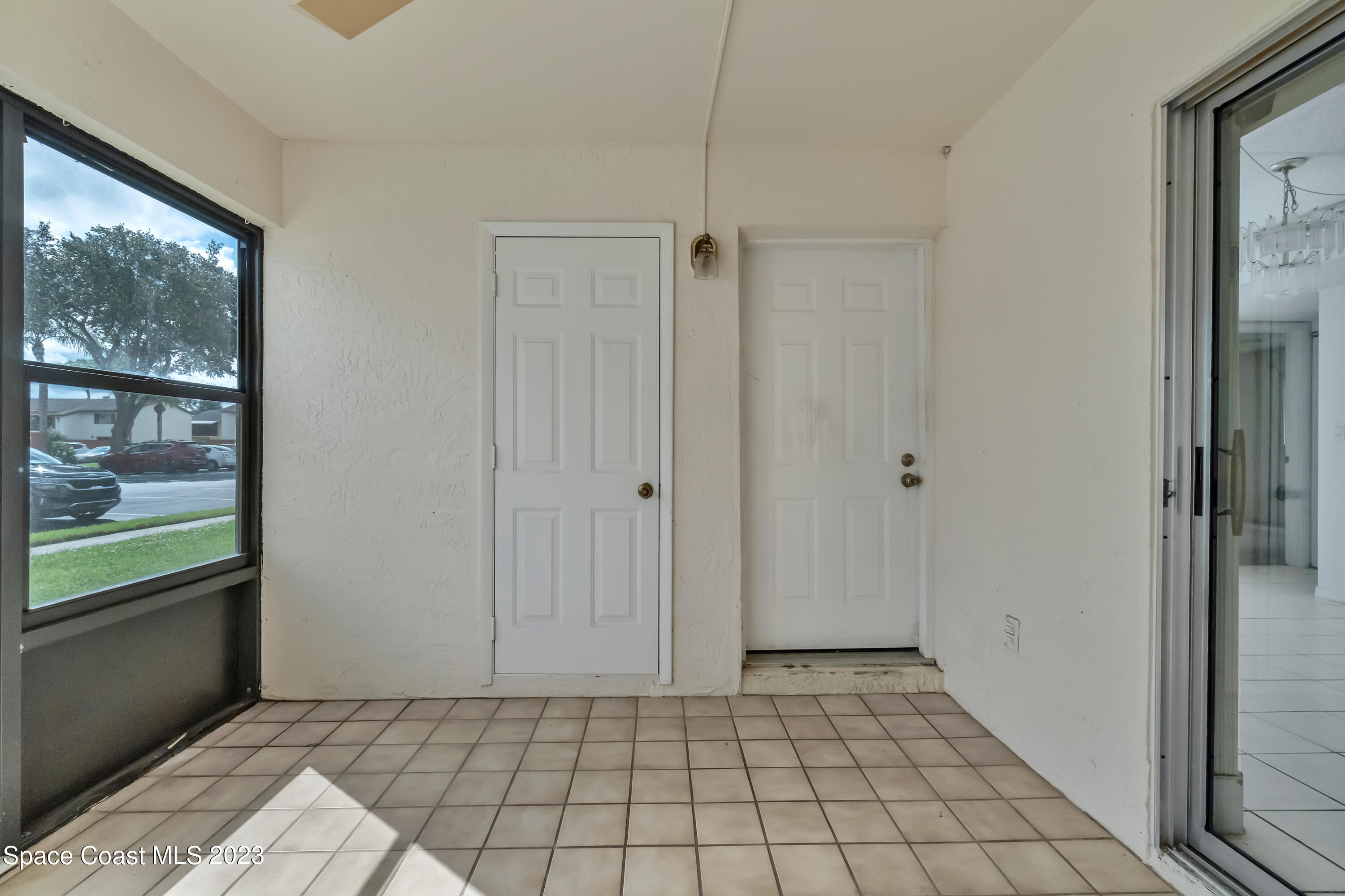 700 Ridge Club Drive, Unit 33 Melbourne, FL 32934 - Photo 3 of 32 a view of an empty room and window