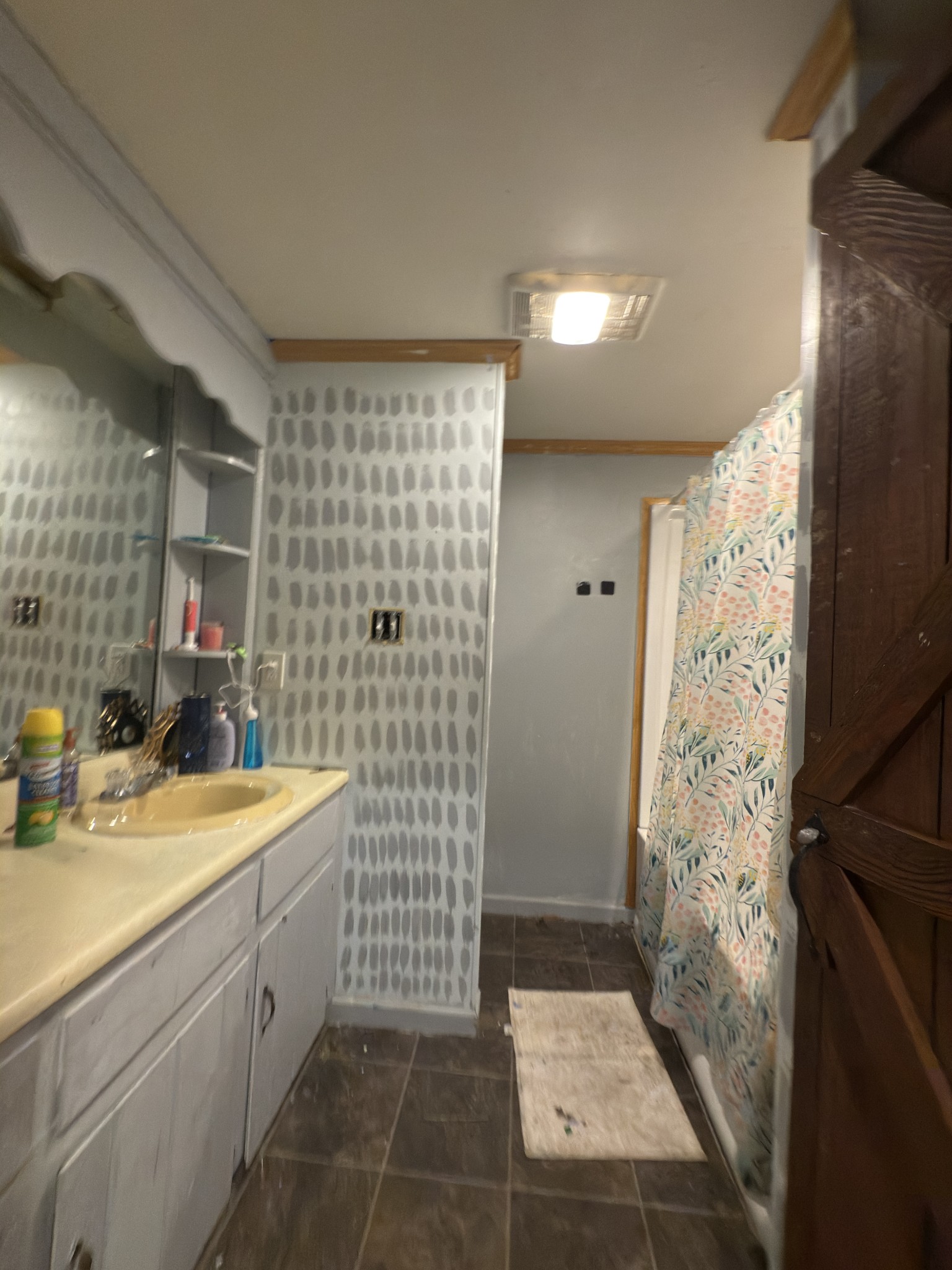 496 Rockhouse Road Hohenwald, TN 38462 - Photo 13 of 36 a bathroom with a sink a toilet and shower