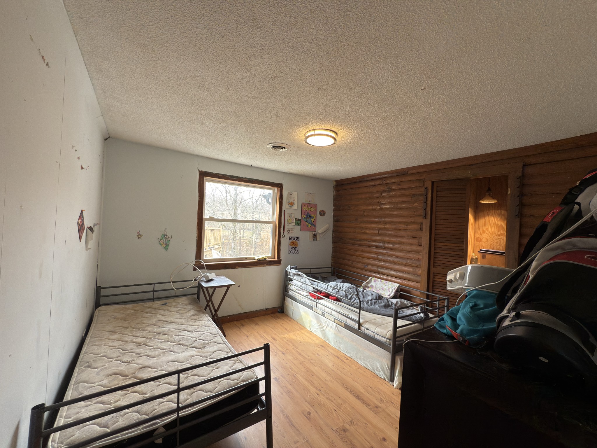 496 Rockhouse Road Hohenwald, TN 38462 - Photo 14 of 36 a living room with furniture and a window
