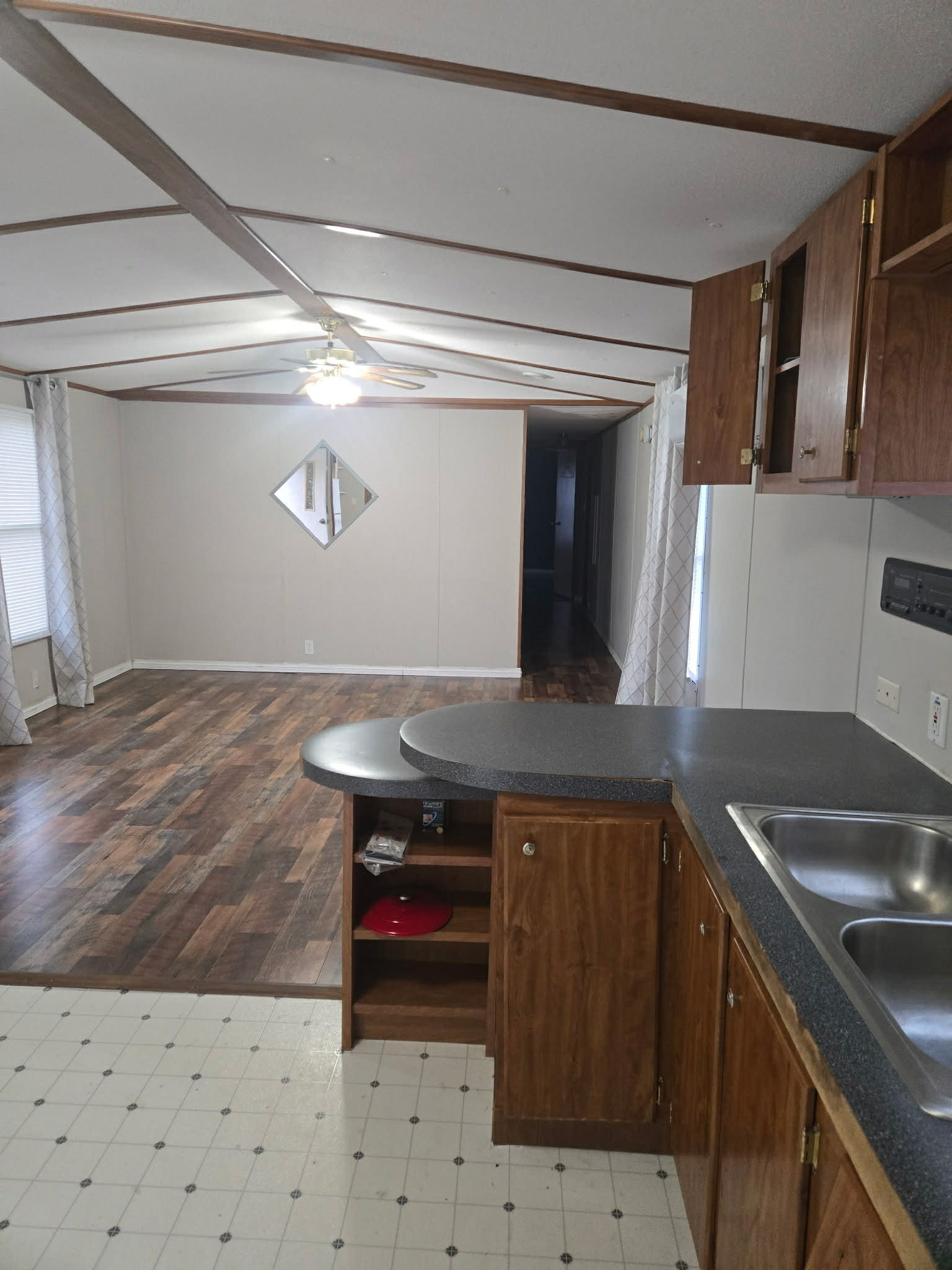 496 Rockhouse Road Hohenwald, TN 38462 - Photo 28 of 36 a kitchen with a sink and cabinets
