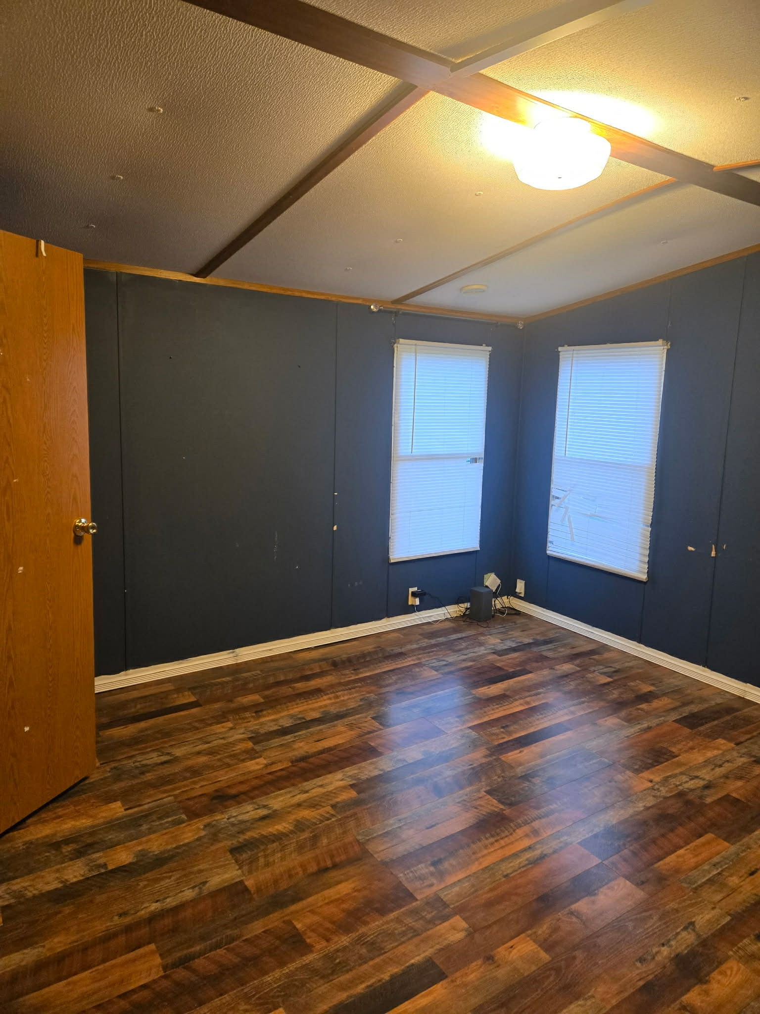 496 Rockhouse Road Hohenwald, TN 38462 - Photo 32 of 36 a view of empty room with wooden floor