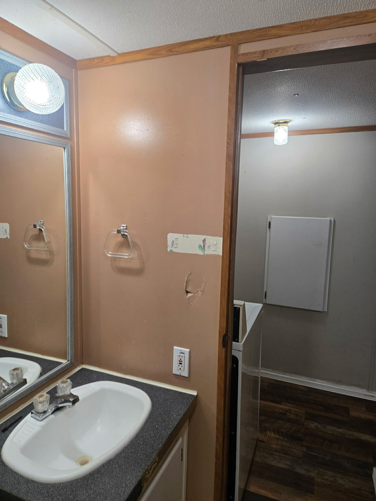 496 Rockhouse Road Hohenwald, TN 38462 - Photo 36 of 36 a bathroom with a sink toilet and shower