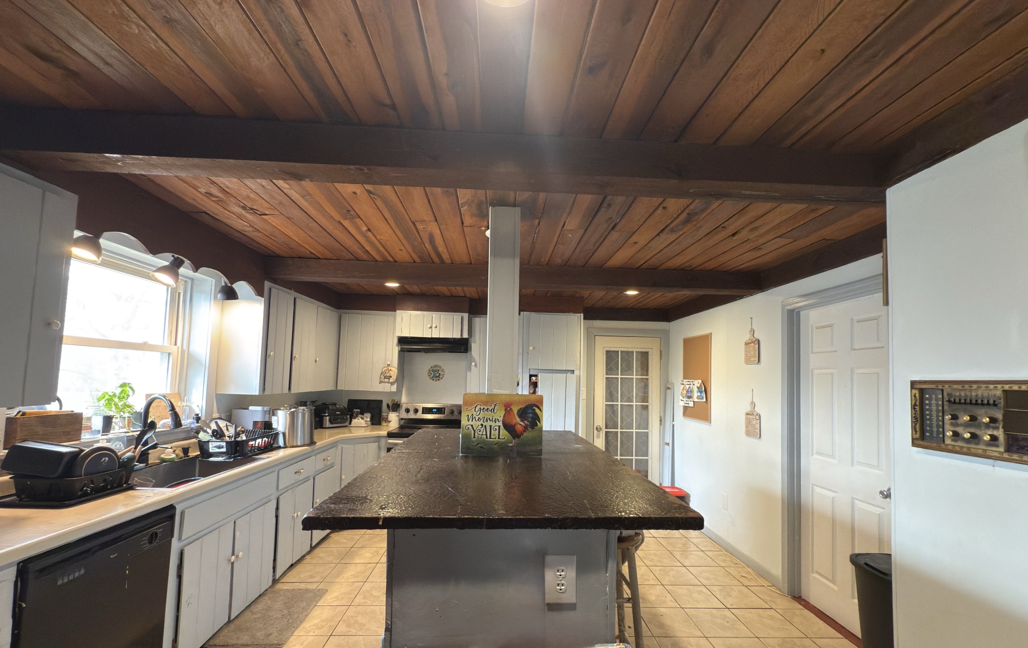496 Rockhouse Road Hohenwald, TN 38462 - Photo 5 of 36 a kitchen with lots of counter top space and a sink