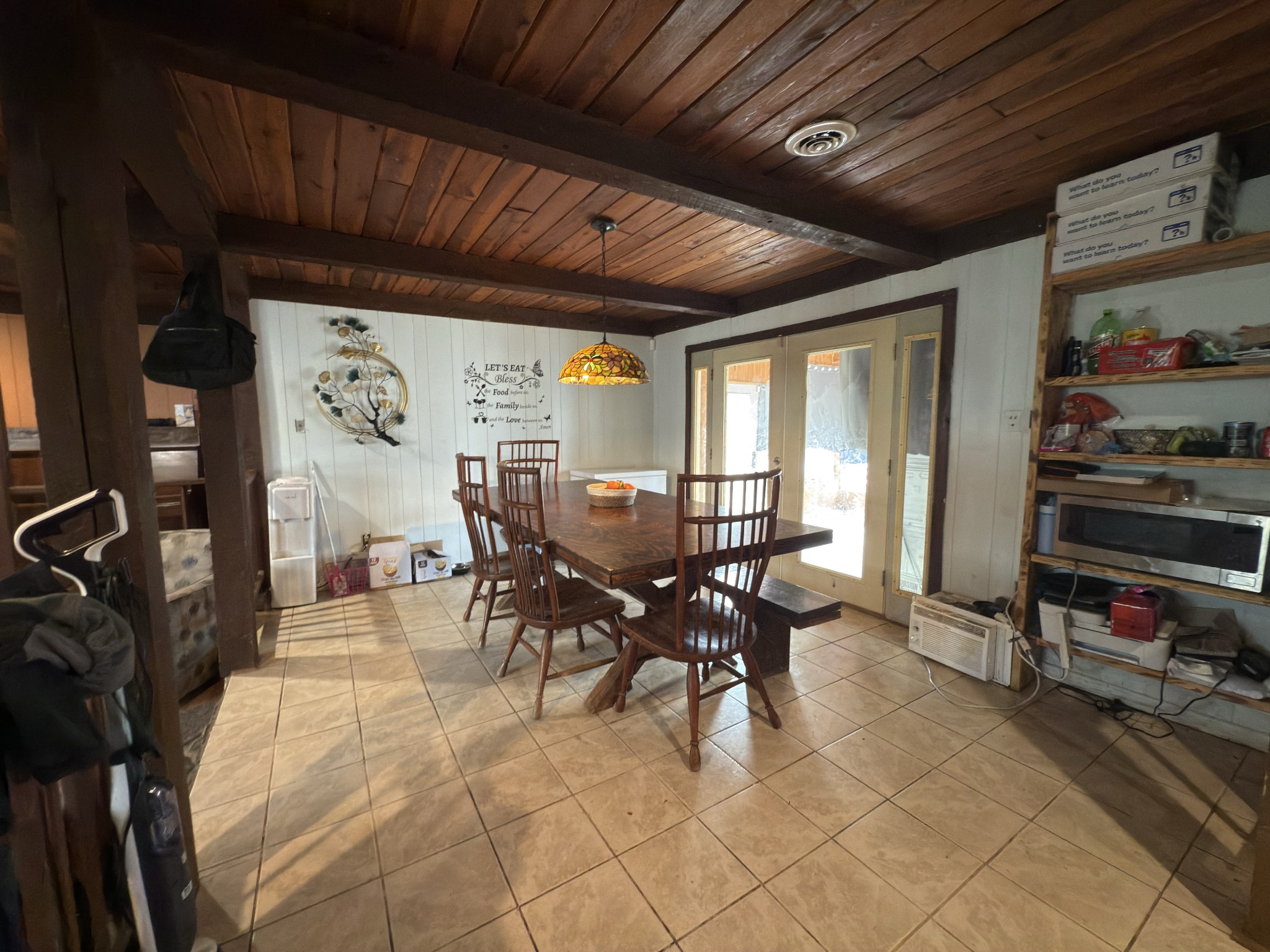 496 Rockhouse Road Hohenwald, TN 38462 - Photo 8 of 36 a view of a dining room with furniture