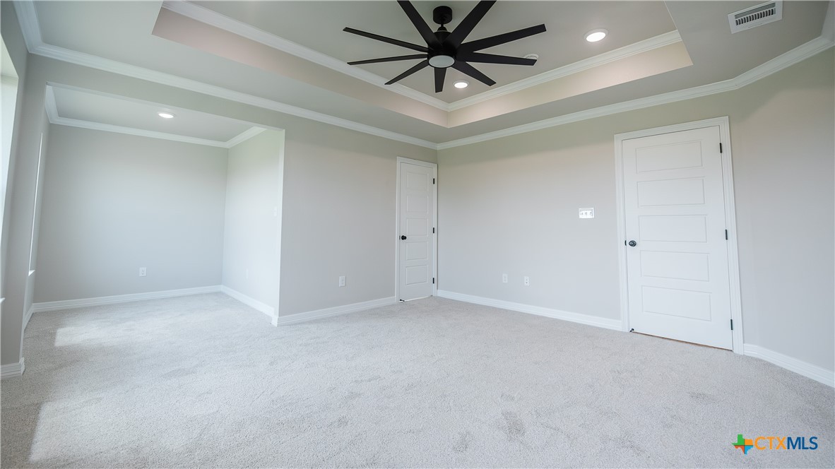 1404 Tahonta Drive Hewitt, TX 76643 - Photo 14 of 32 an empty room with chandelier fan