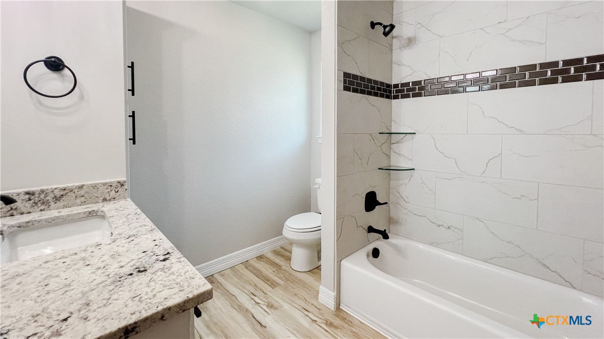 1404 Tahonta Drive Hewitt, TX 76643 - Photo 29 of 32 a bathroom with a bathtub and shower