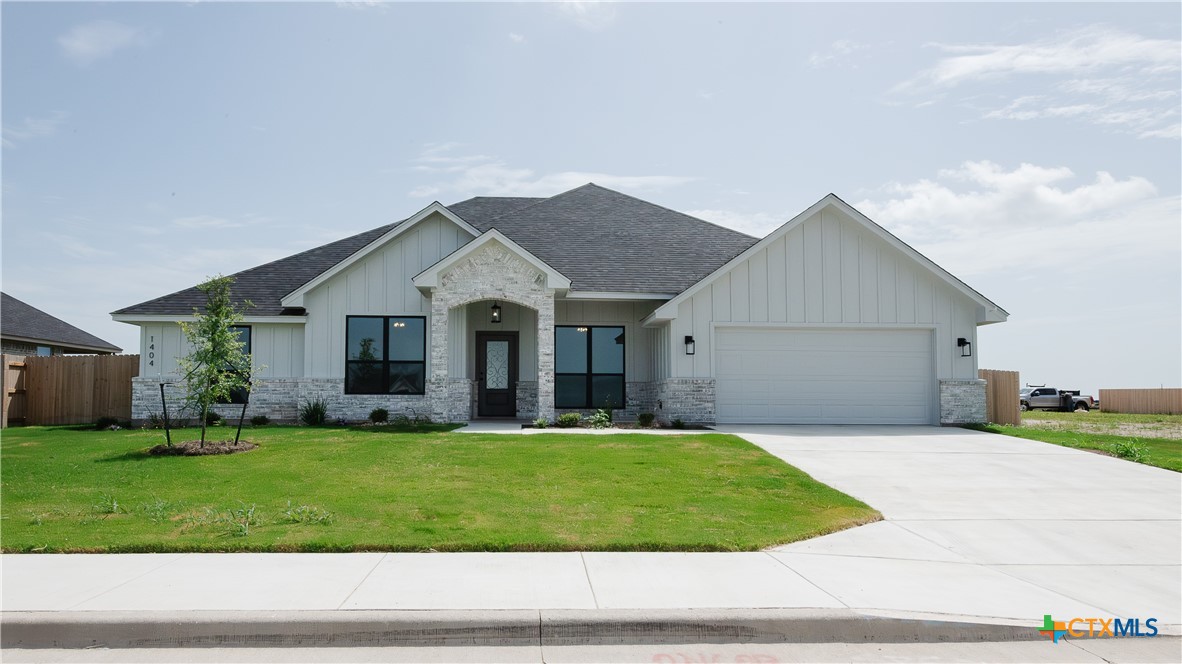 1404 Tahonta Drive Hewitt, TX 76643 - Photo 32 of 32 a front view of house with yard and garage