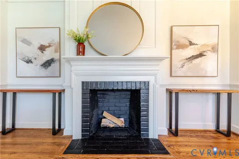 an outdoor living room with a fireplace