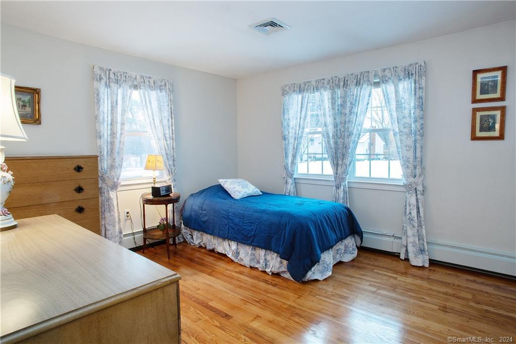 44 Alder Road Simsbury, CT 06070 - Photo 20 of 33 Bedroom #2 with lots of natural light and hardwood floors
